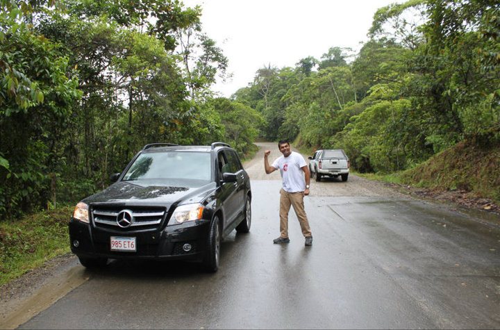 Sanjay Gupta on a road in West Africa with his vehicle