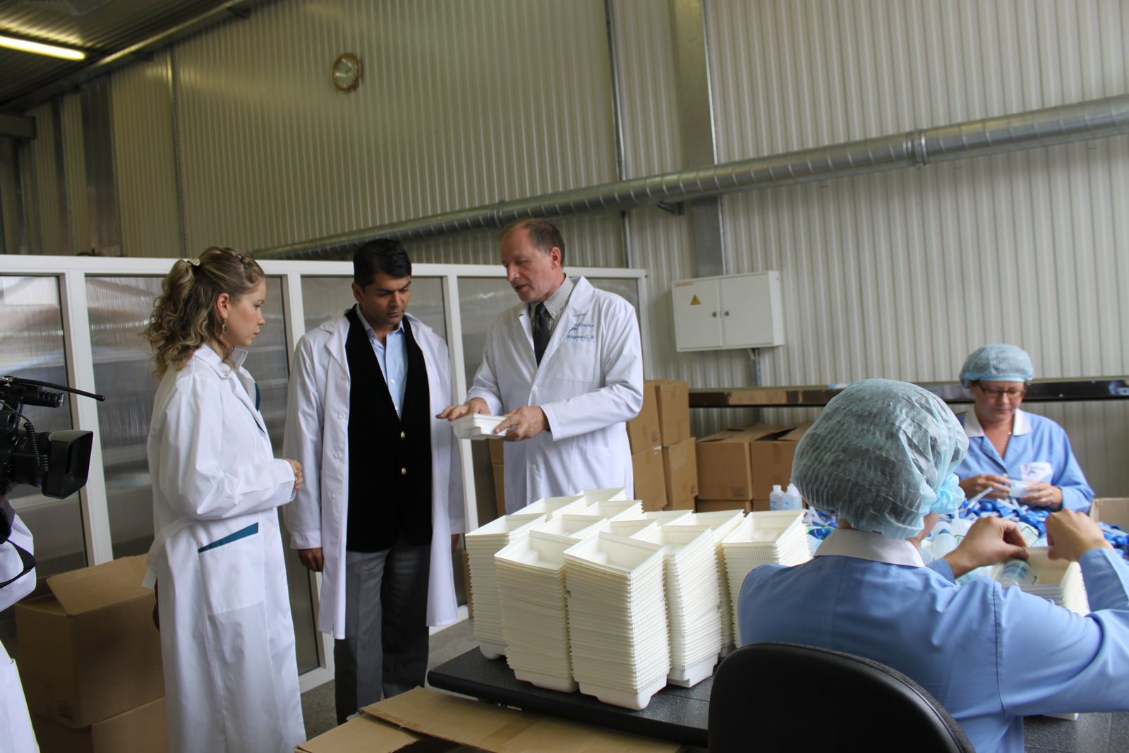 Sanjay Gupta visiting a factory in Russia
